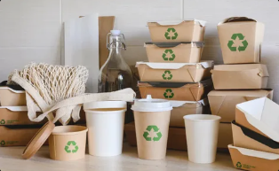 Sustainable packaging development workspace with recyclable materials